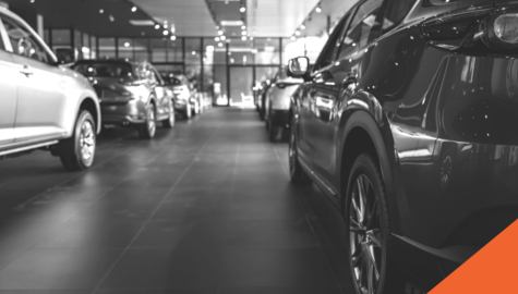 The Latest Information on the Global Car Supply Chain Shortage  | cars lined up inside a dealership | Billyard Insurance Group Blog